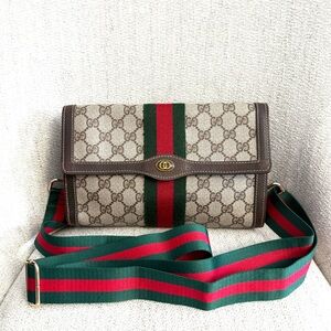 Authentic Gucci clutch converted into a crossbody bag brown monogram canvas